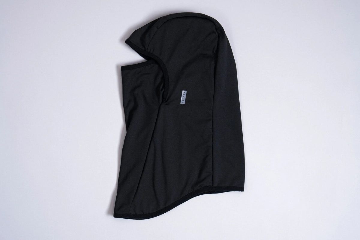 Black fleece-lined balaclava by Autumn Headwear, snow face protection accessory, designed for warmth in cold weather.