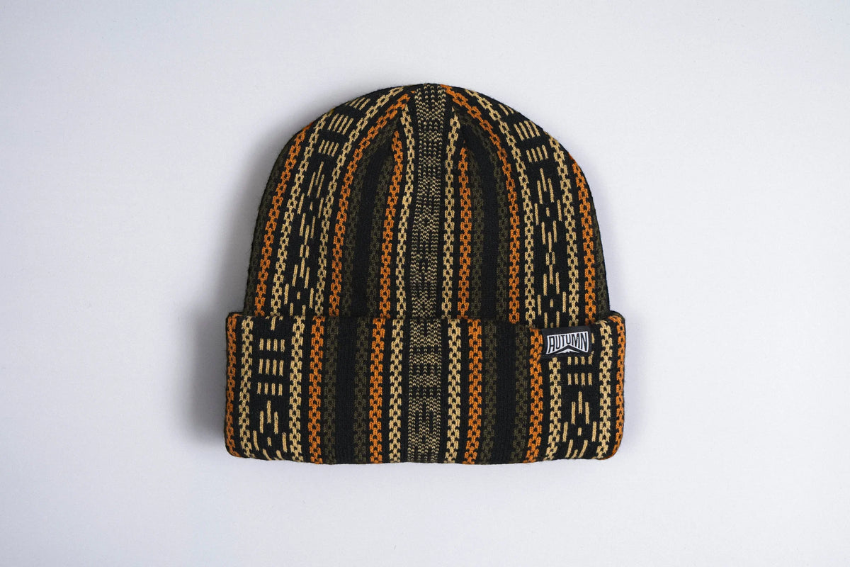 Black Autumn Knapsack Beanie by Autumn Headwear, cozy knit accessory featuring a stylish, snug fit for autumn weather.