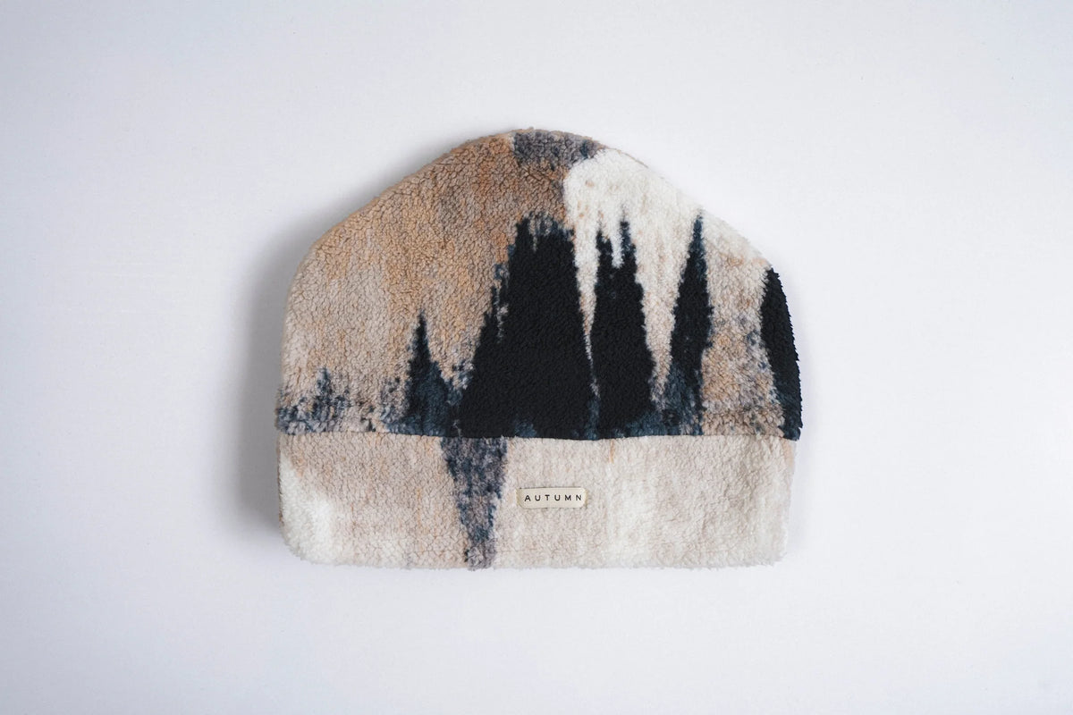Autumn Mtn Goat Beanie in Sand by Autumn Headwear, cozy knit accessory with mountain goat design, perfect for fall and winter wear.