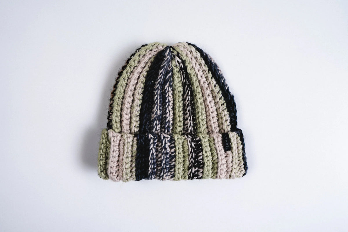 Autumn Headwear patchwork beanie in sandy beige, cozy knit accessory featuring colorful patchwork design for fall style.