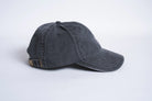 Black Autumn Six Panel Strapback hat from Autumn Headwear, showing front and side view with adjustable strap.