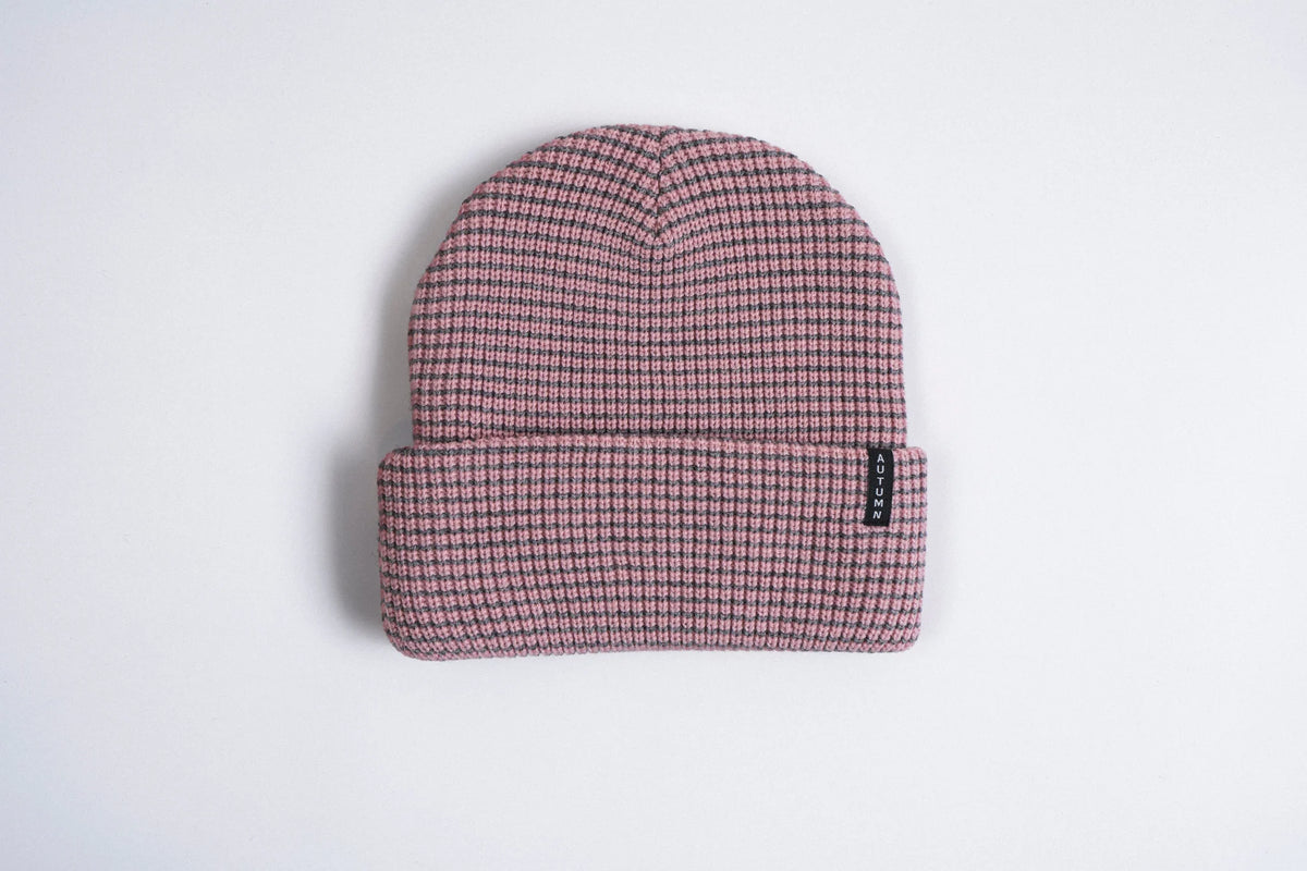 Pink Autumn Stripe Beanie by Autumn Headwear, a cozy knitted accessory with colorful stripe patterns for autumn style.