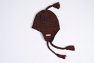 Autumn Swell Ear Flap Beanie in Harissa color showing cozy knit fabric and ear flaps, designed by Autumn Headwear for warmth and style.