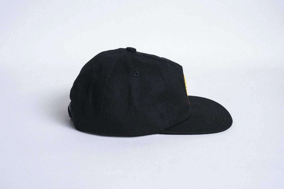 Black Autumn Twill Five Panel Snapback hat by Autumn Headwear, showing front and side view of the stylish accessory.