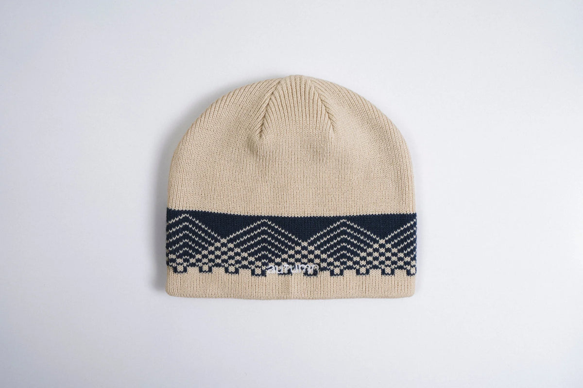 Autumn Warp Beanie in shell color by Autumn Headwear, cozy knit accessory with a folded brim, perfect for fall weather.