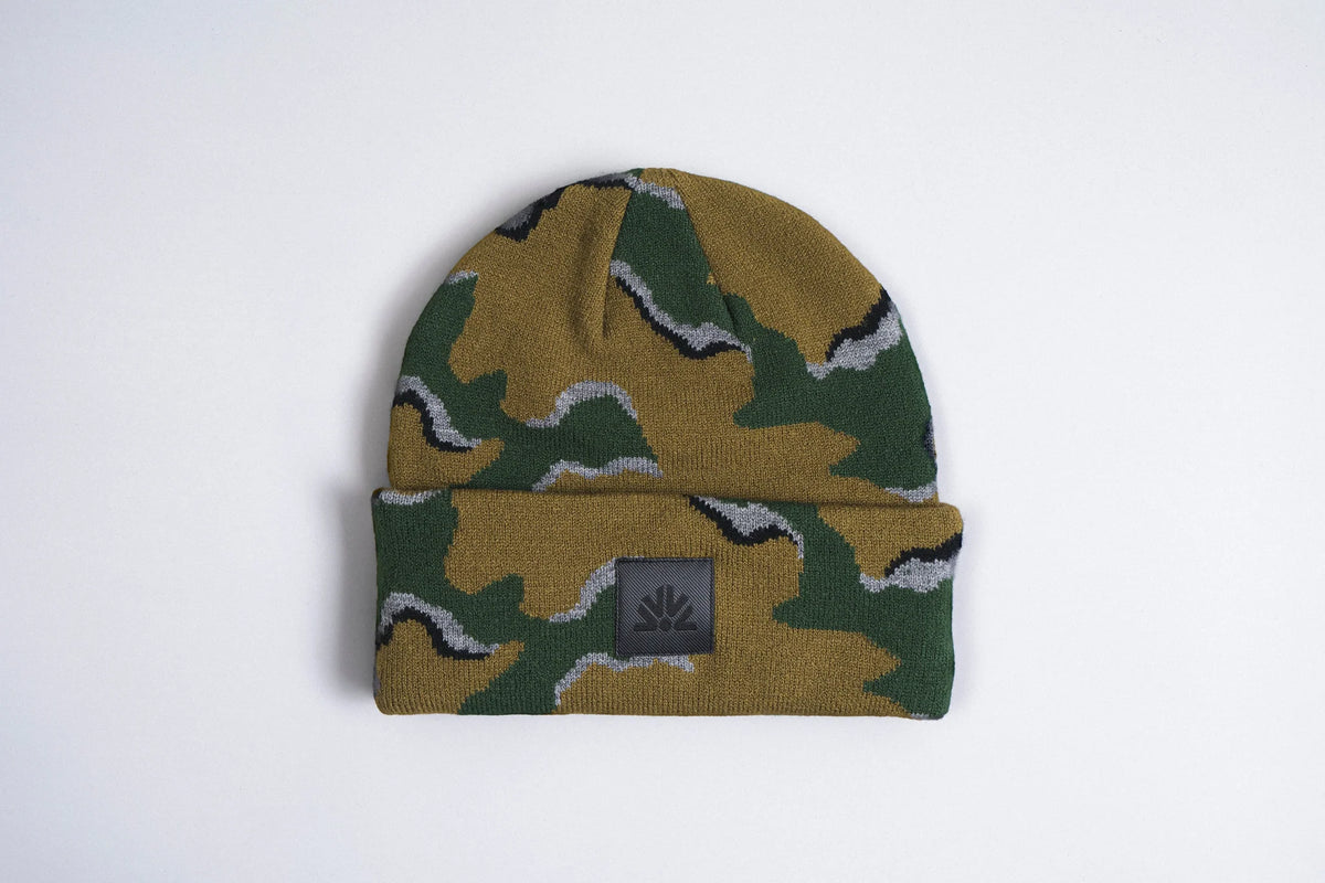 Autumn Wavy Camo Beanie in Fir color by Autumn Headwear, featuring a cozy, wavy camouflage knit design for fall accessories.