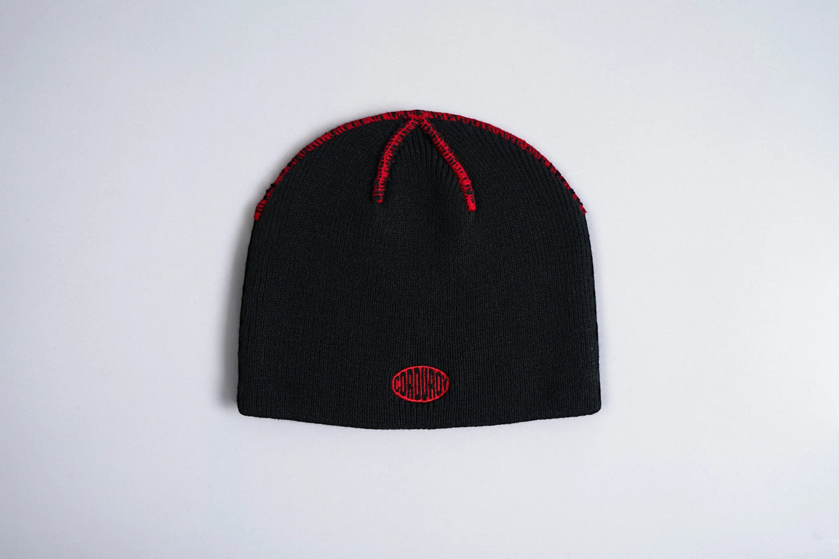 Black Corduroy Brand Skully Beanie from Corduroy Headwear, showcasing a snug, stylish knit beanie with a rounded silhouette.