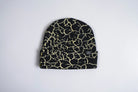 Black Corduroy Rumble Beanie by Corduroy Headwear, showcasing a cozy, textured knit hat on a plain background.