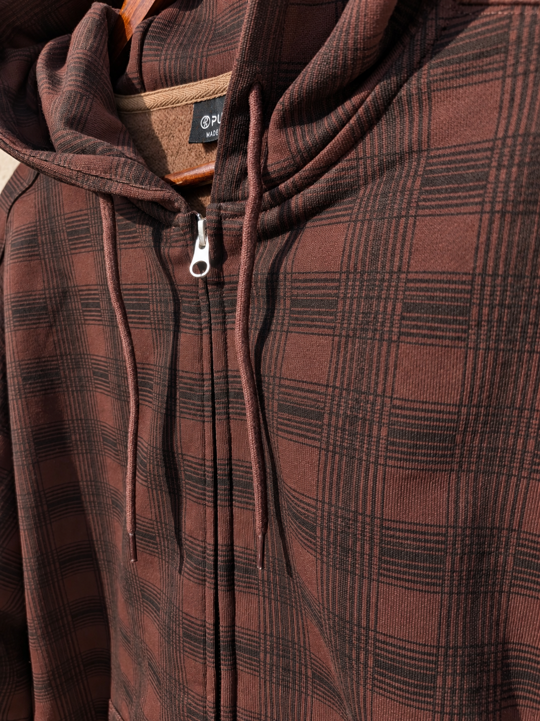 Public Snowboards men's brown plaid zip-up hoodie with front pockets, casual sweatshirt, comfortable and stylish for everyday wear.