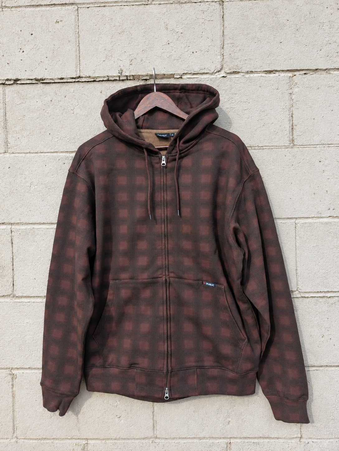 Public Snowboards men's brown plaid zip-up hoodie, casual sweatshirt with a front zipper and cozy fit, ideal for everyday wear.