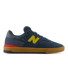 New Balance Numeric Jamie Foy 306C cupsole skate shoes in shadow blue and yellow, medial side view