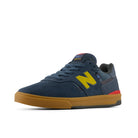 New Balance Numeric Jamie Foy 306C cupsole skate shoe in shadow blue and yellow, angled view