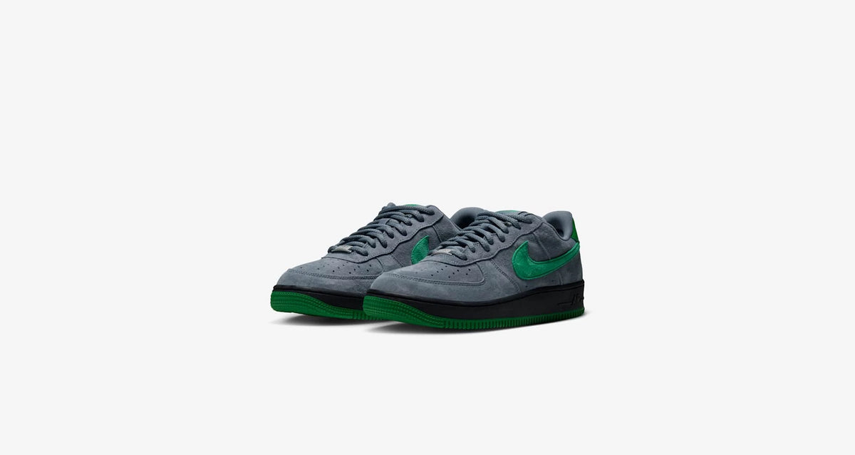 Nike SB 'Nocturnal' Air Force 1 Low SE men's shoes in cool grey and court green, angled pair view