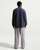 Nike SB Woven Skate Pants in Silver Lilac and Palest Purple, men's pants shown from the back