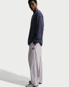 Nike SB men's woven skate pants in silver lilac and palest purple, side viewacles