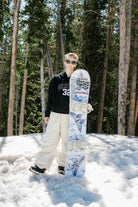 ThirtyTwo women's Gemini snowboard lifestyle image showing the snowboard design and graphics