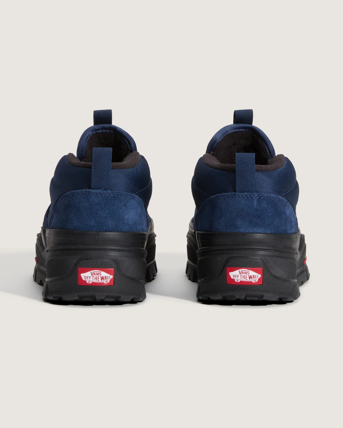 Vans Mid-Slip Puff shoes in true navy with slip-on design and padded upper for men