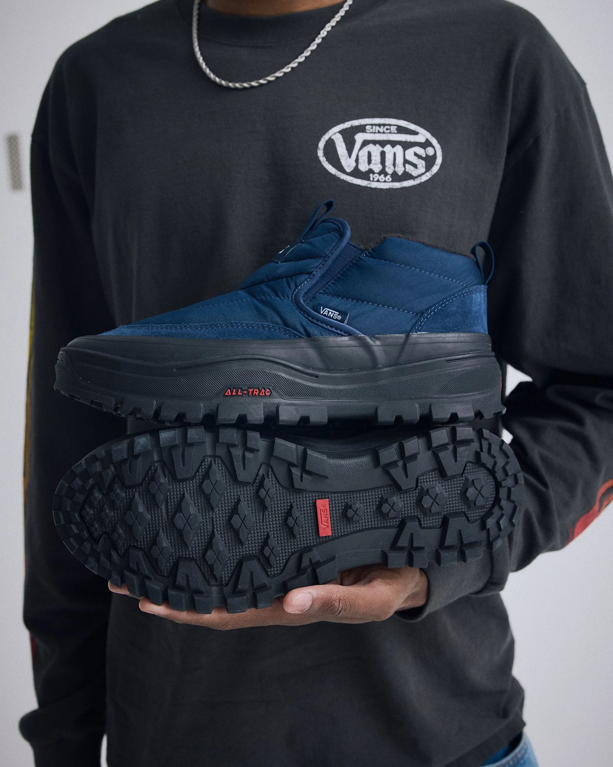 Vans Mid-Slip Puff shoes in true navy with slip-on design and cushioned upper for men