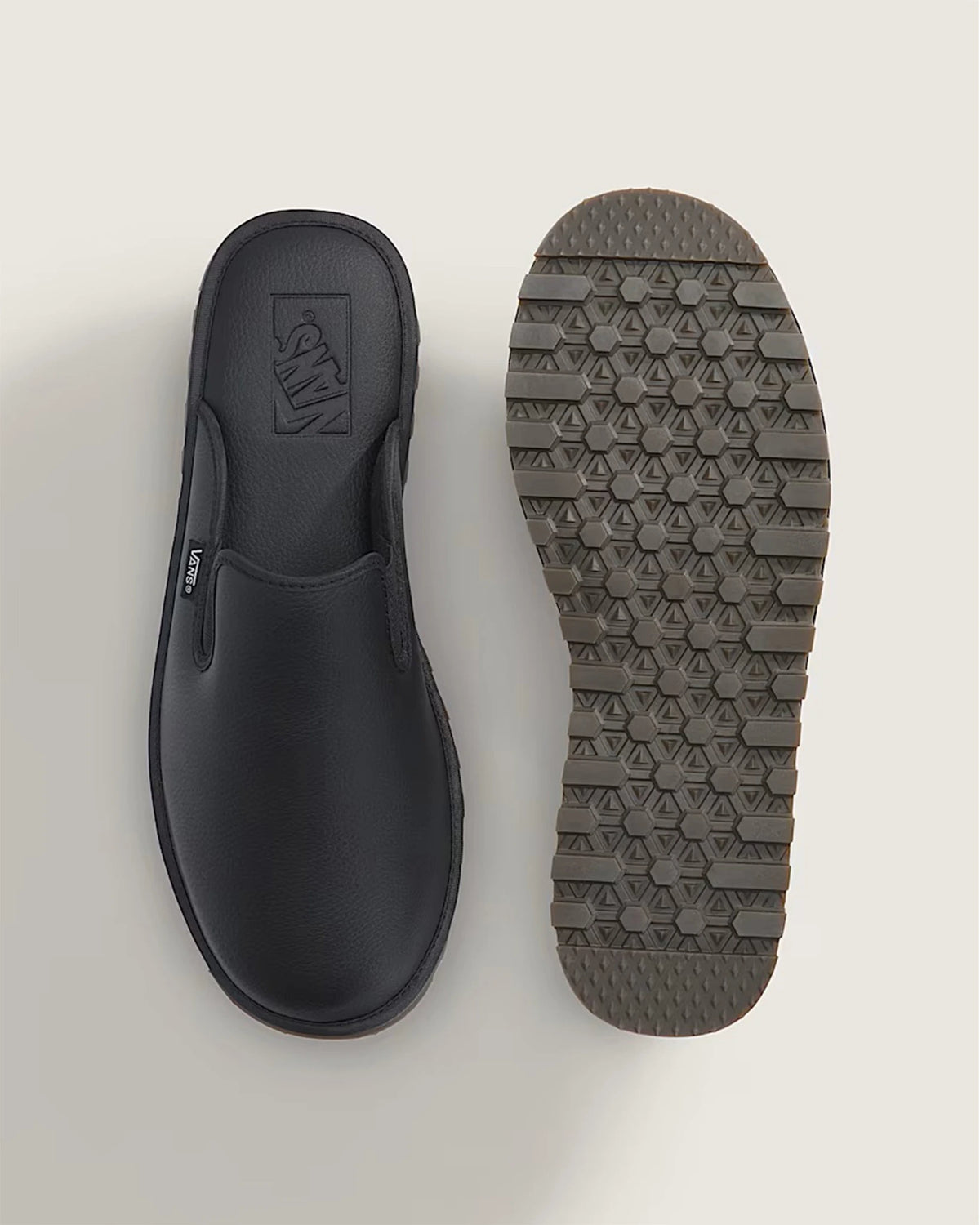 vans mountain mule blackout top and outsole